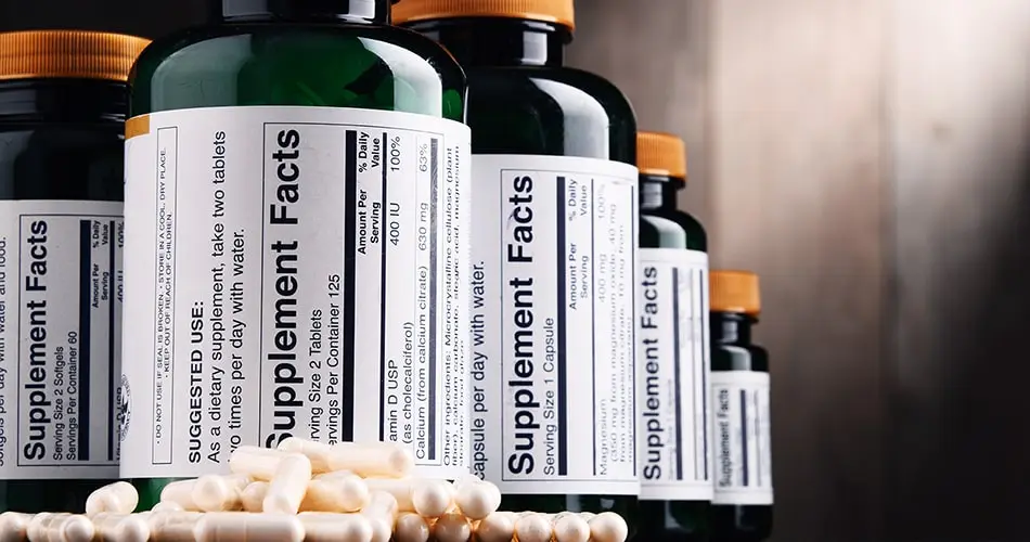 Photo Of 5 Bottles With Vitamines And Supplements
