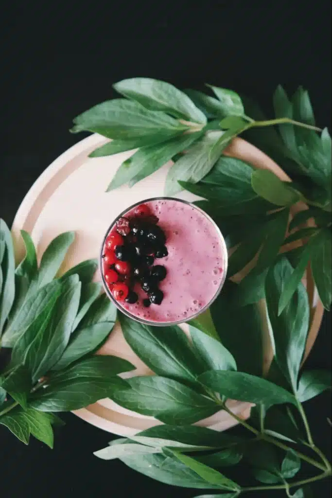 Image11 11Zon A Glass Of Berry Smoothie On Top Of Green Leaves