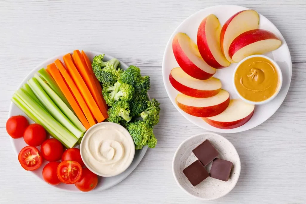 Image1 11Zon 18 A Plate Of Vegetables And Fruit On A White Surface
