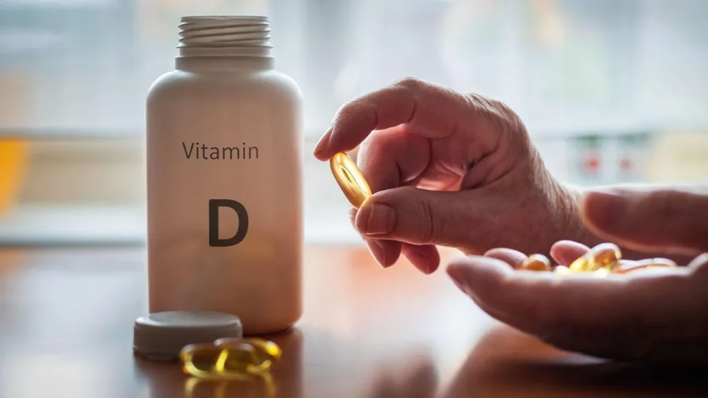 Image4 11Zon 16 A Hand Holding A Vitamin D Pill