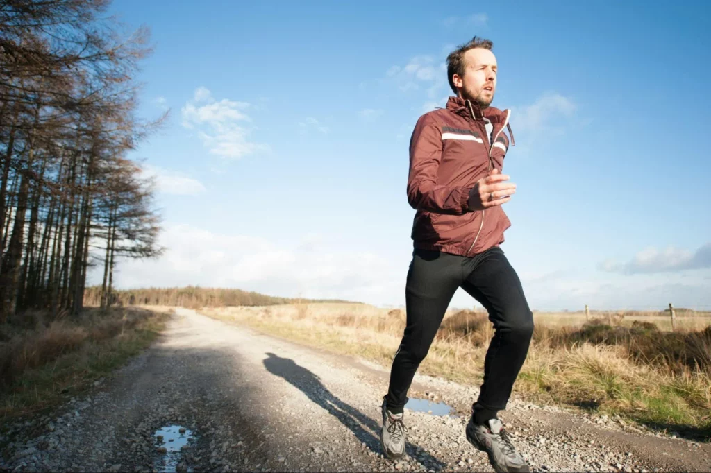 Image7 11Zon 3 A Man Running On A Dirt Road