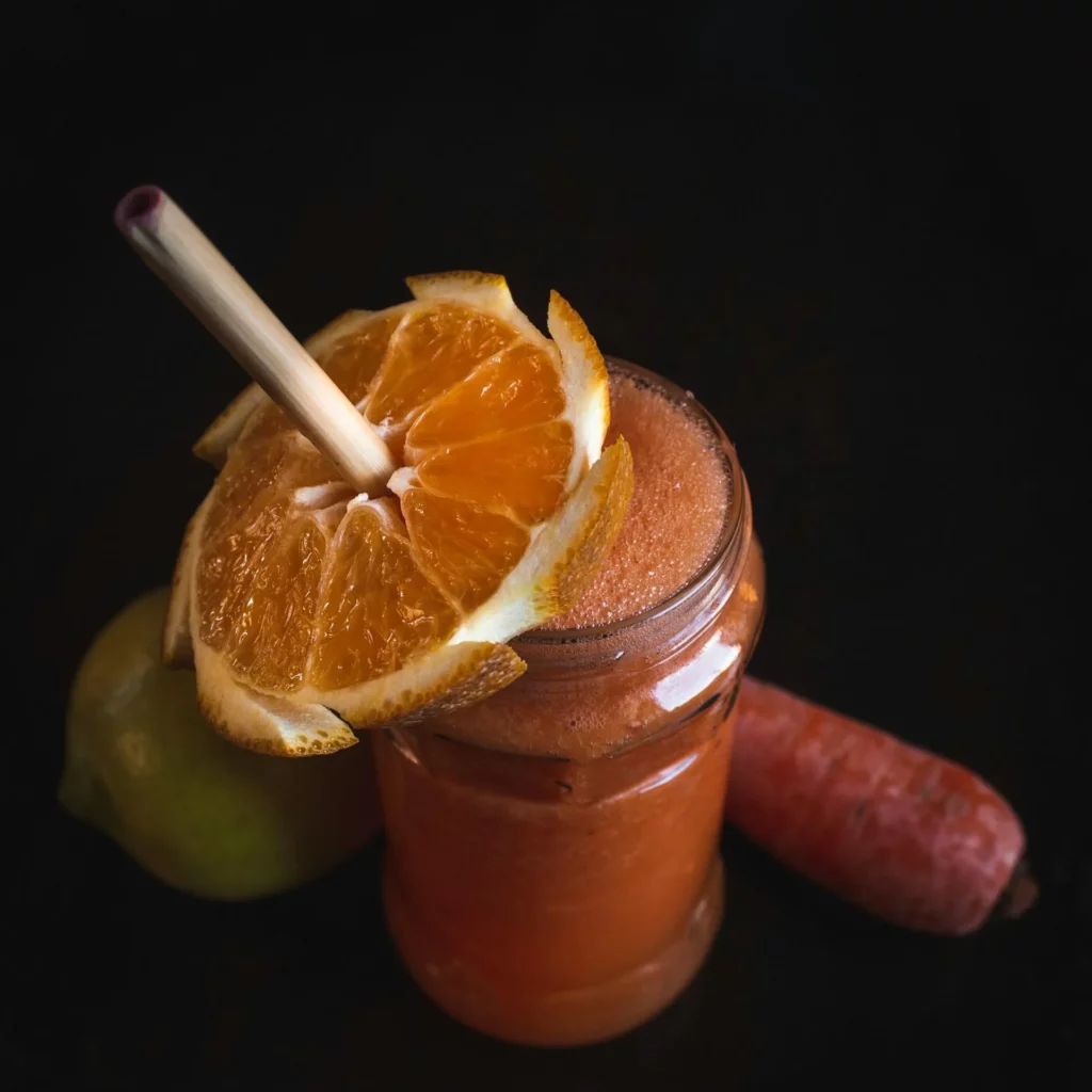 Image9 11Zon 10 A Glass Jar With Fruit Juice, Fruit And A Straw On Top Of It