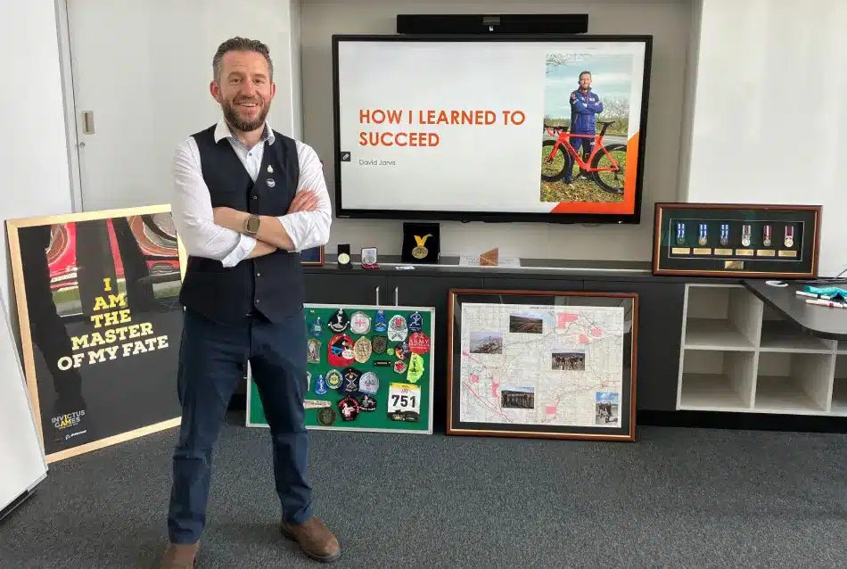 David Jarvis Standing In Front Of A Screen